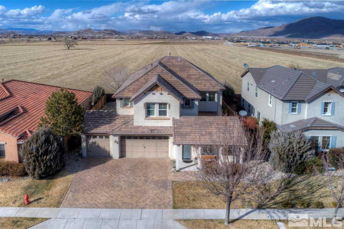 425 Manciano Way Reno, NV 89521 - Photo 2 of 28 an aerial view of a house with a lake view