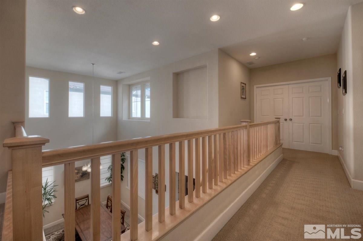 425 Manciano Way Reno, NV 89521 - Photo 21 of 28 a view of staircase with rug floor