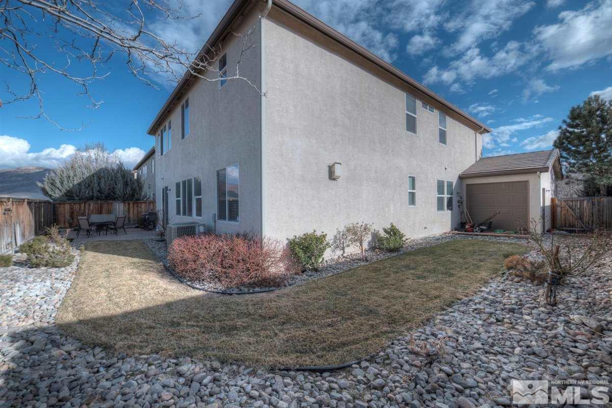 425 Manciano Way Reno, NV 89521 - Photo 24 of 28 a view of a backyard
