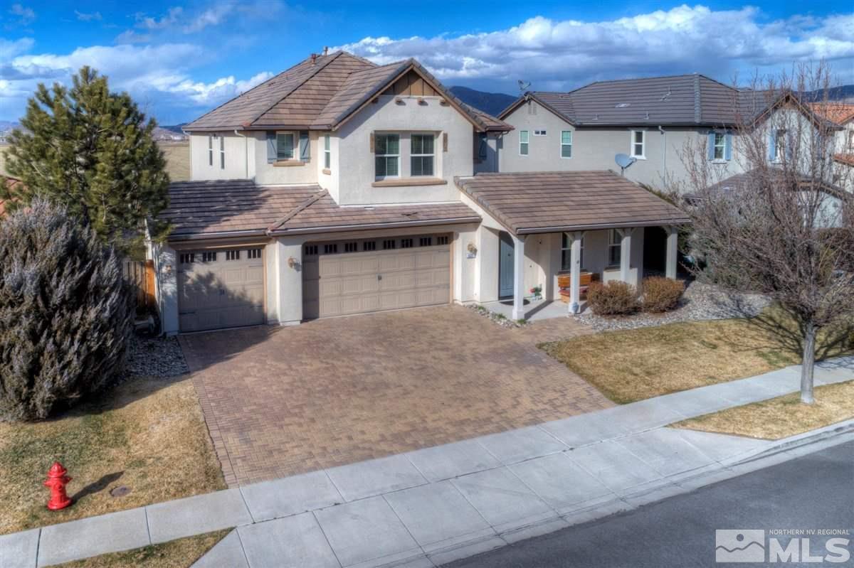 425 Manciano Way Reno, NV 89521 - Photo 27 of 28 a front view of a house with garden