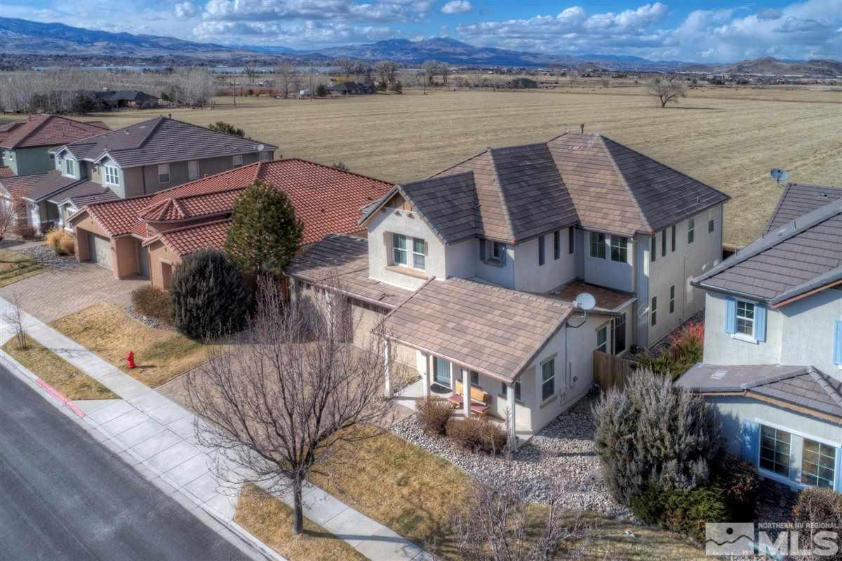 425 Manciano Way Reno, NV 89521 - Photo 3 of 28 an aerial view of a house with a lake view