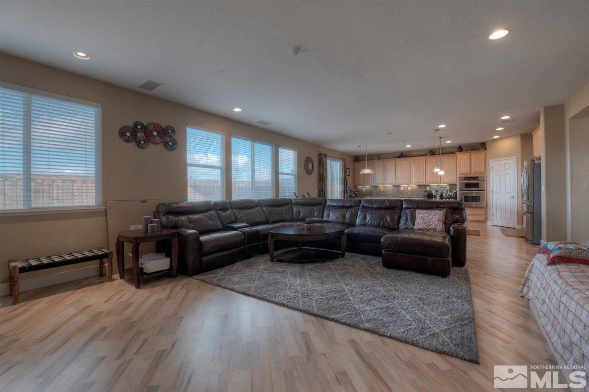 425 Manciano Way Reno, NV 89521 - Photo 10 of 28 a living room with furniture and a couch