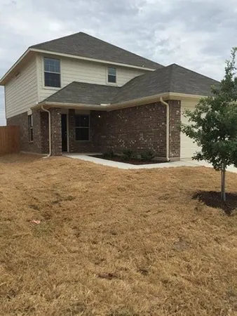 a front view of house with yard
