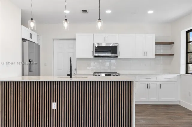 $460,000 | 1950 Northwest 57th Street, Miami, FL 33142