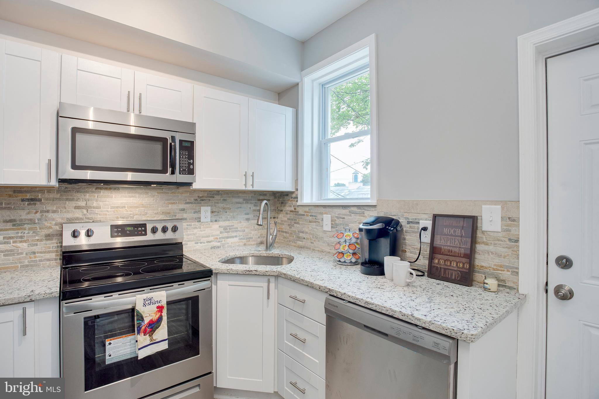 210 South Loudon Avenue Baltimore, MD 21229 - Photo 25 of 28 The layout features a corner kitchen sink.