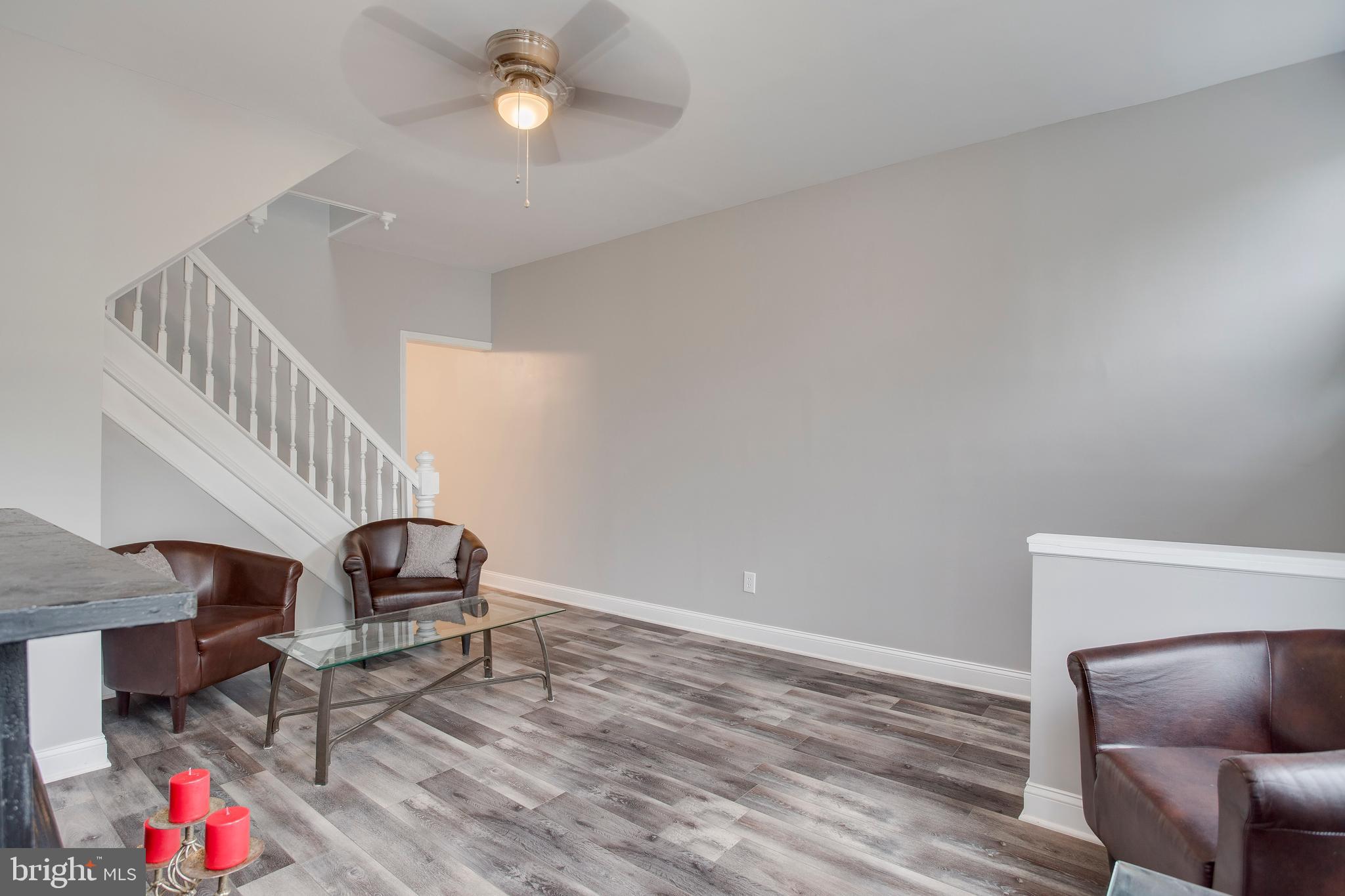 210 South Loudon Avenue Baltimore, MD 21229 - Photo 7 of 28 Beautiful new floors and fresh paint throughout.