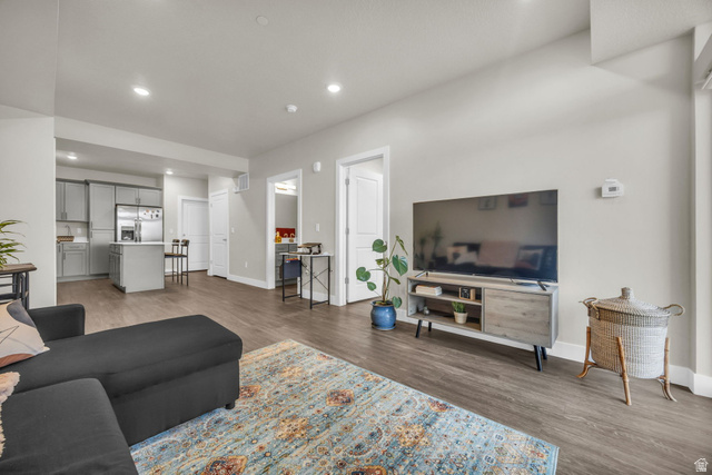 2101 North Main Street, Unit 409 Sunset, UT 84015 - Photo 5 of 18 Living room with recessed lighting and dark wood-style floors