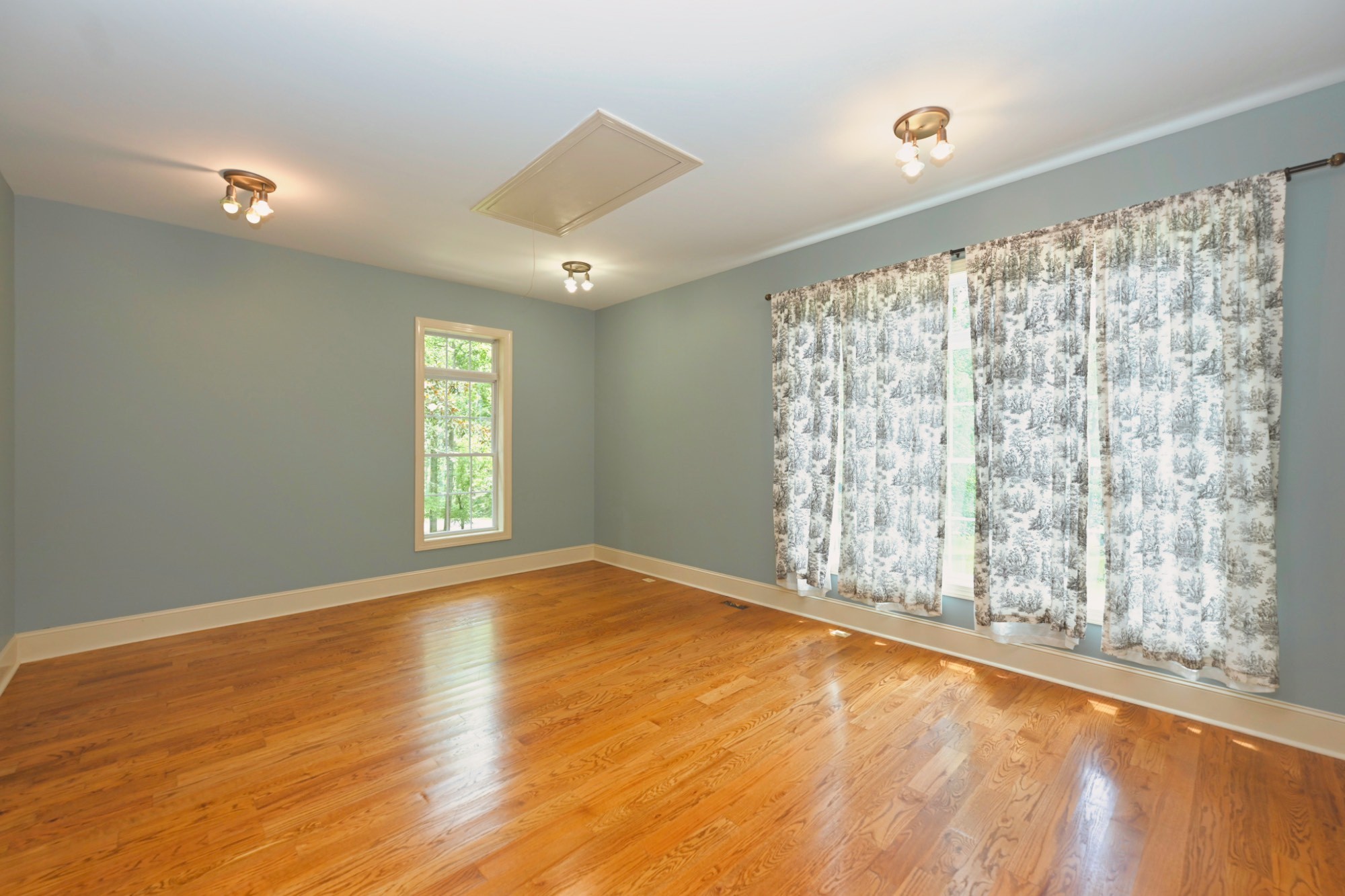 125 Happy Hollow Road Goodlettsville, TN 37072 - Photo 46 of 92 a view of empty room with wooden floor and fan