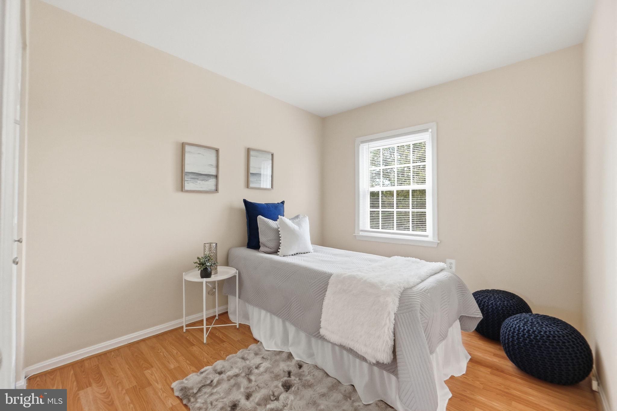 6470 Franconia Court Springfield, VA 22150 - Photo 17 of 31 a bedroom with a bed and a window