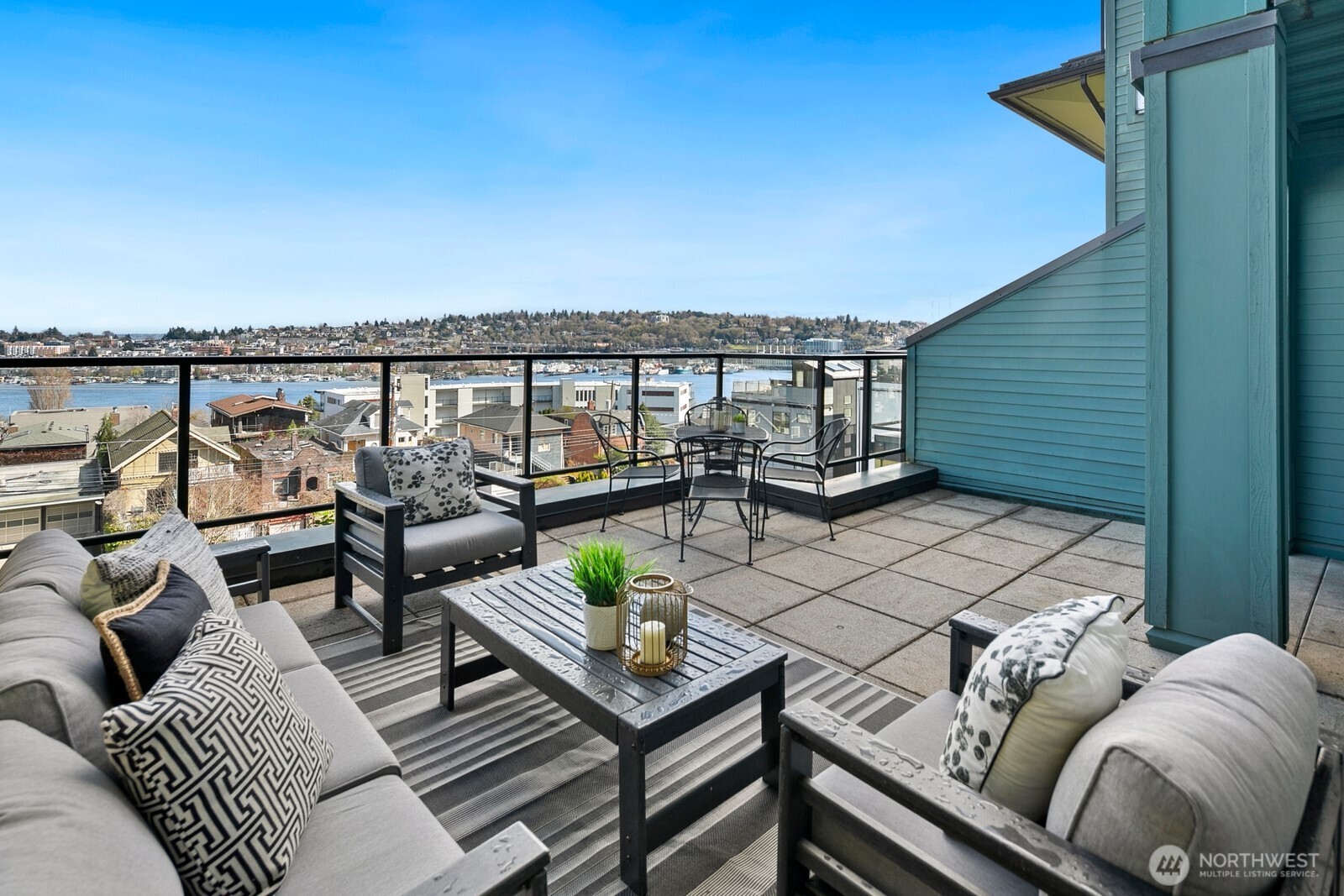 655 Crockett Street, Unit A204 Seattle, WA 98109 - Photo 1 of 23 a view of a terrace with couches and a table