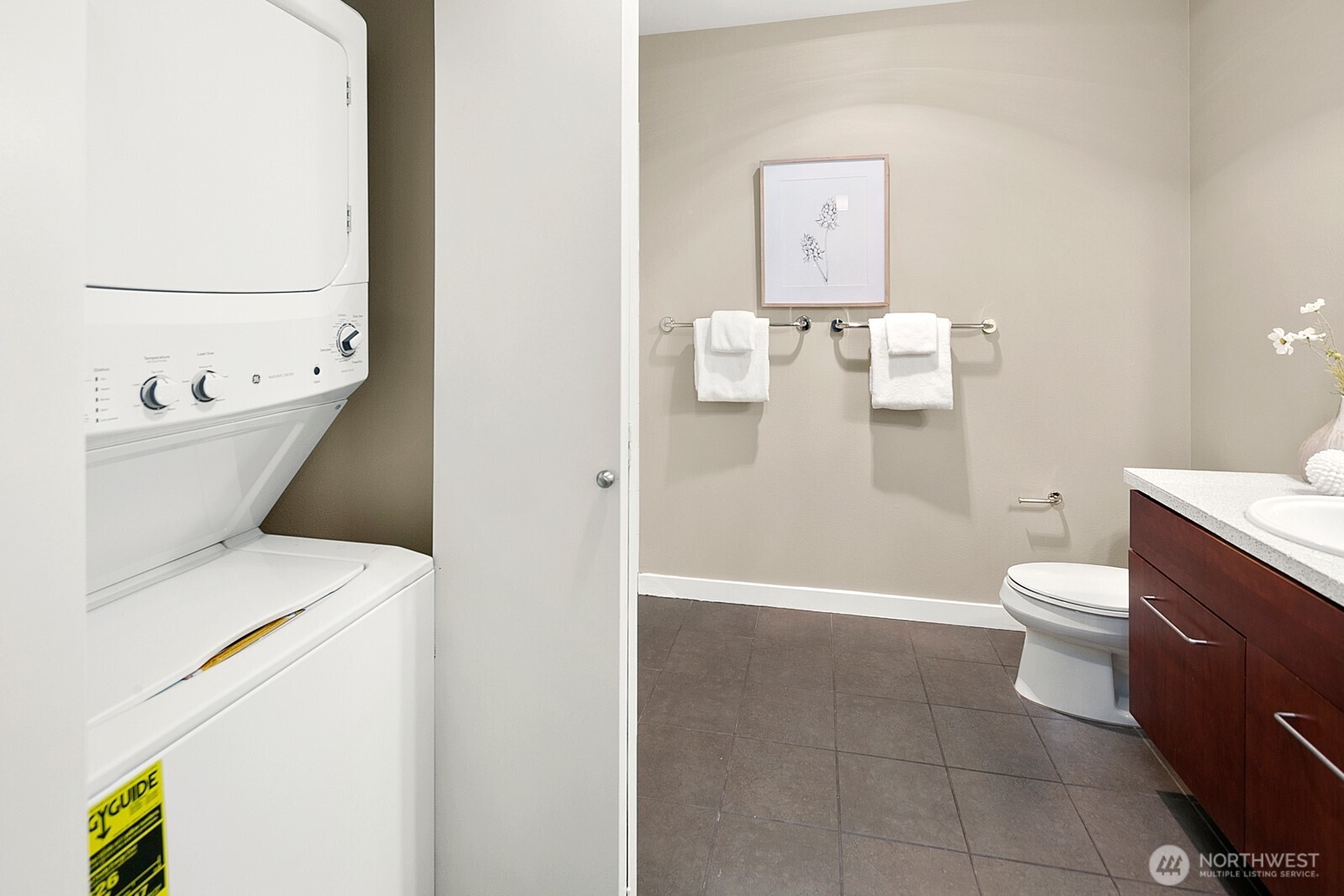 655 Crockett Street, Unit A204 Seattle, WA 98109 - Photo 19 of 23 a bathroom with a toilet and a shower