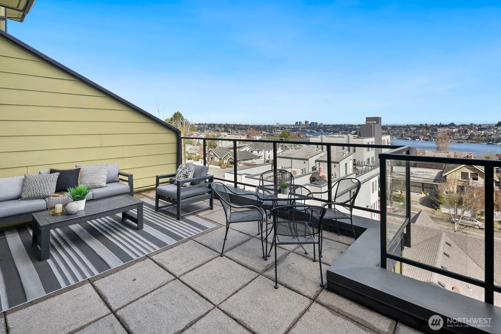 655 Crockett Street, Unit A204 Seattle, WA 98109 - Photo 22 of 23 a view of a terrace with seating area