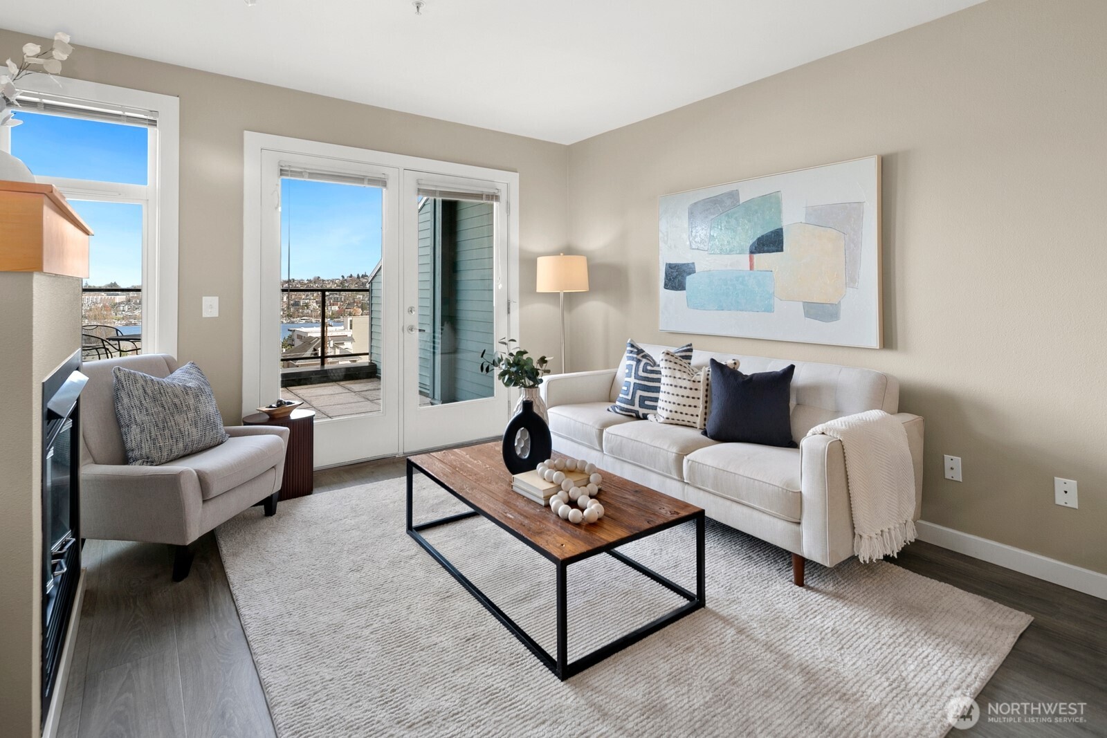 655 Crockett Street, Unit A204 Seattle, WA 98109 - Photo 7 of 23 a living room with furniture and a potted plant