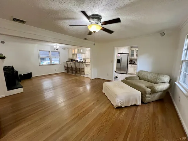 a bathroom with a granite countertop sink a vanity and a mirror
