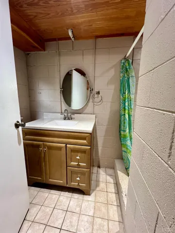 a kitchen with stainless steel appliances a stove and refrigerator