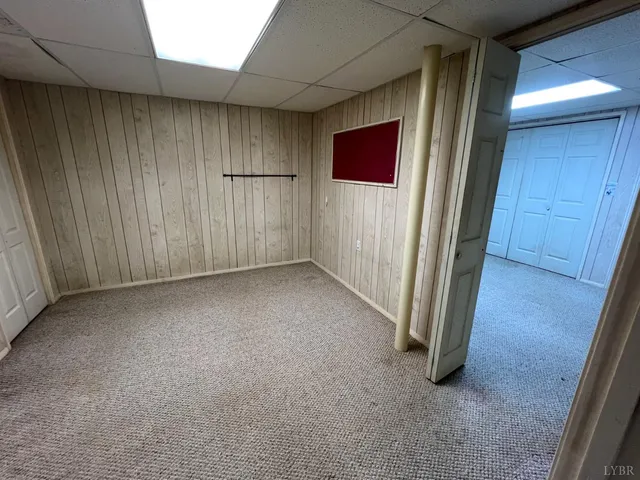 a view of a backyard with sitting area