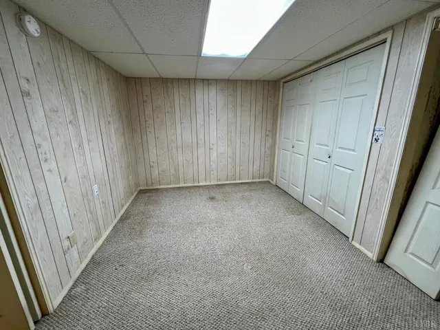 a view of balcony with wooden floor