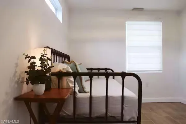 a view of a chairs and table in a room