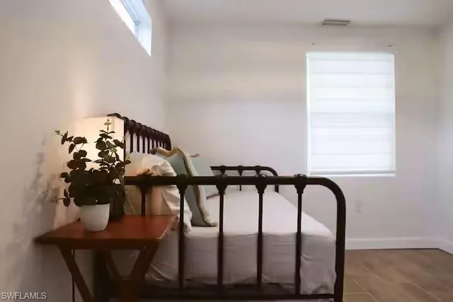 a view of a chairs and table in a room