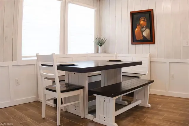 a kitchen with a stove and a window