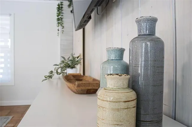 a close view of light fixtures and a potted plant
