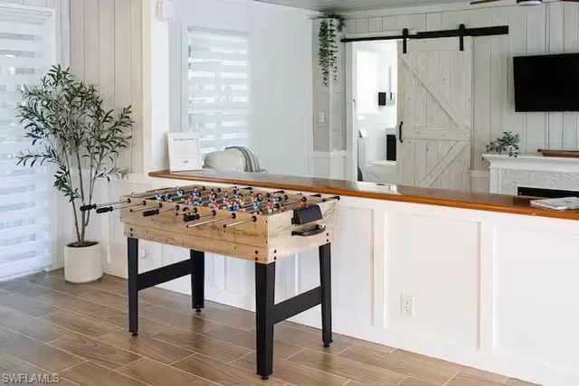 a bathroom with a sink a mirror and a shower