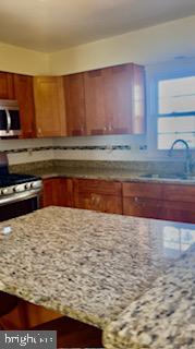 1 Maple Point Drive Langhorne, PA 19047 - Photo 3 of 12 a view of kitchen with wooden floor