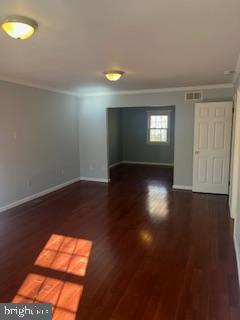 1 Maple Point Drive Langhorne, PA 19047 - Photo 8 of 12 an empty room with wooden floor and windows