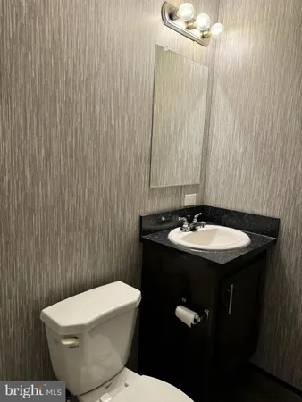 a bathroom with a sink and a toilet