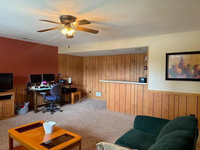 a room with furniture and a chandelier