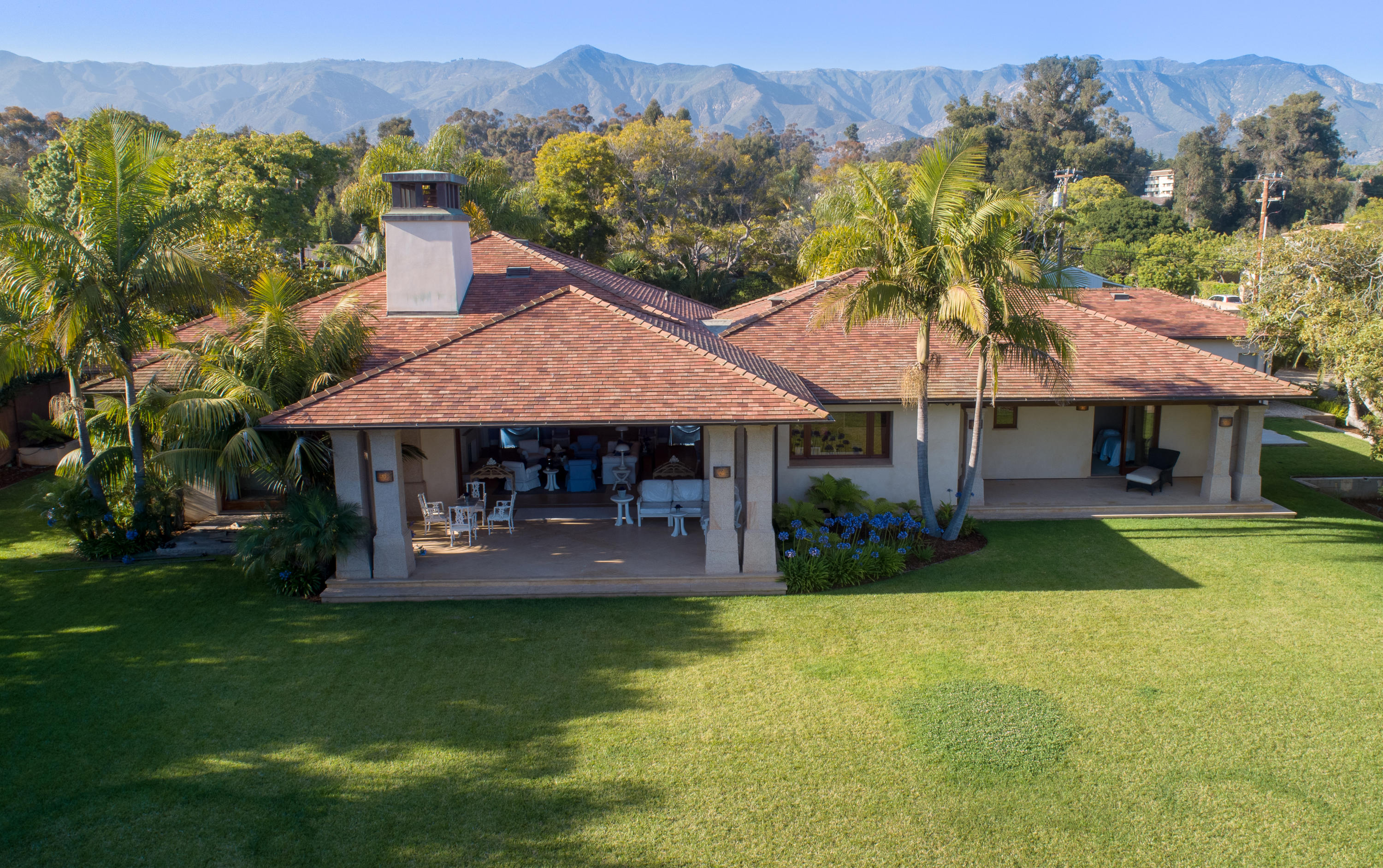 1127 Hill Road Montecito, CA 93108 - Photo 1 of 19 a couple of table and chairs under an umbrella