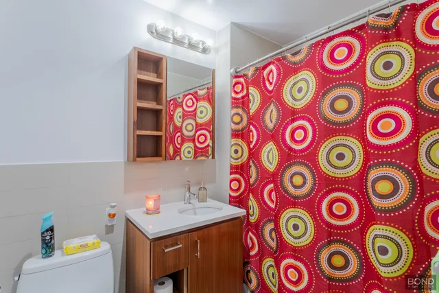 a bathroom with a sink and a table