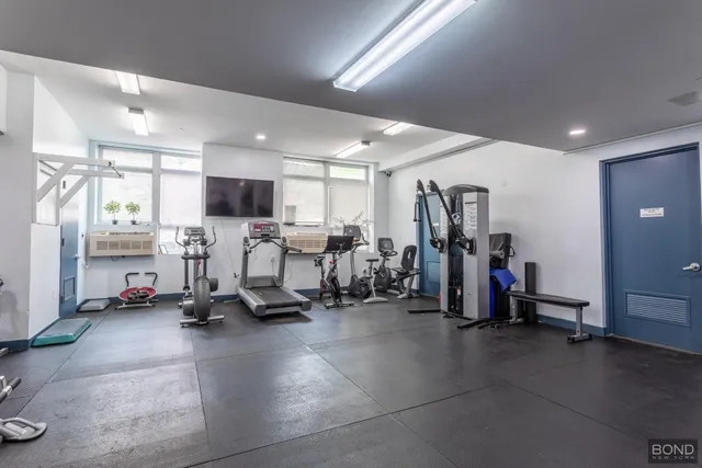 a view of a room with gym equipment
