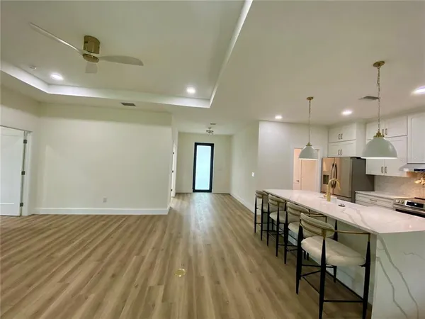 a view of table and chairs in a room