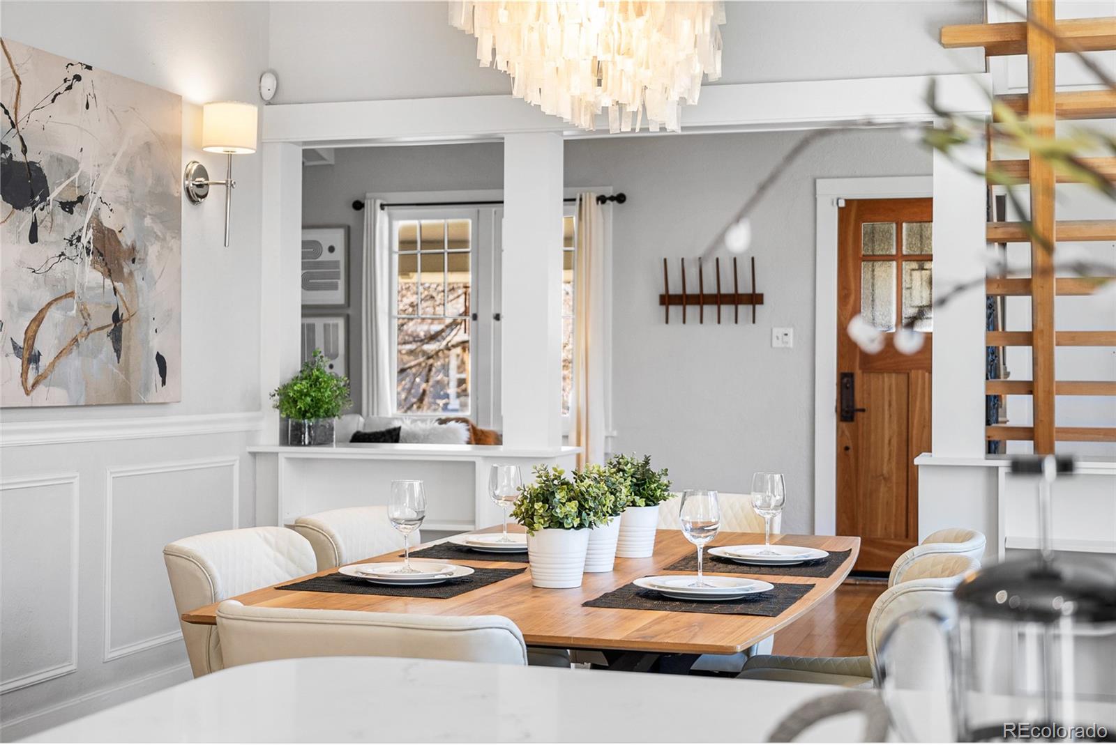1065 Jackson Street Denver, CO 80206 - Photo 14 of 50 a kitchen with a table and chairs in it