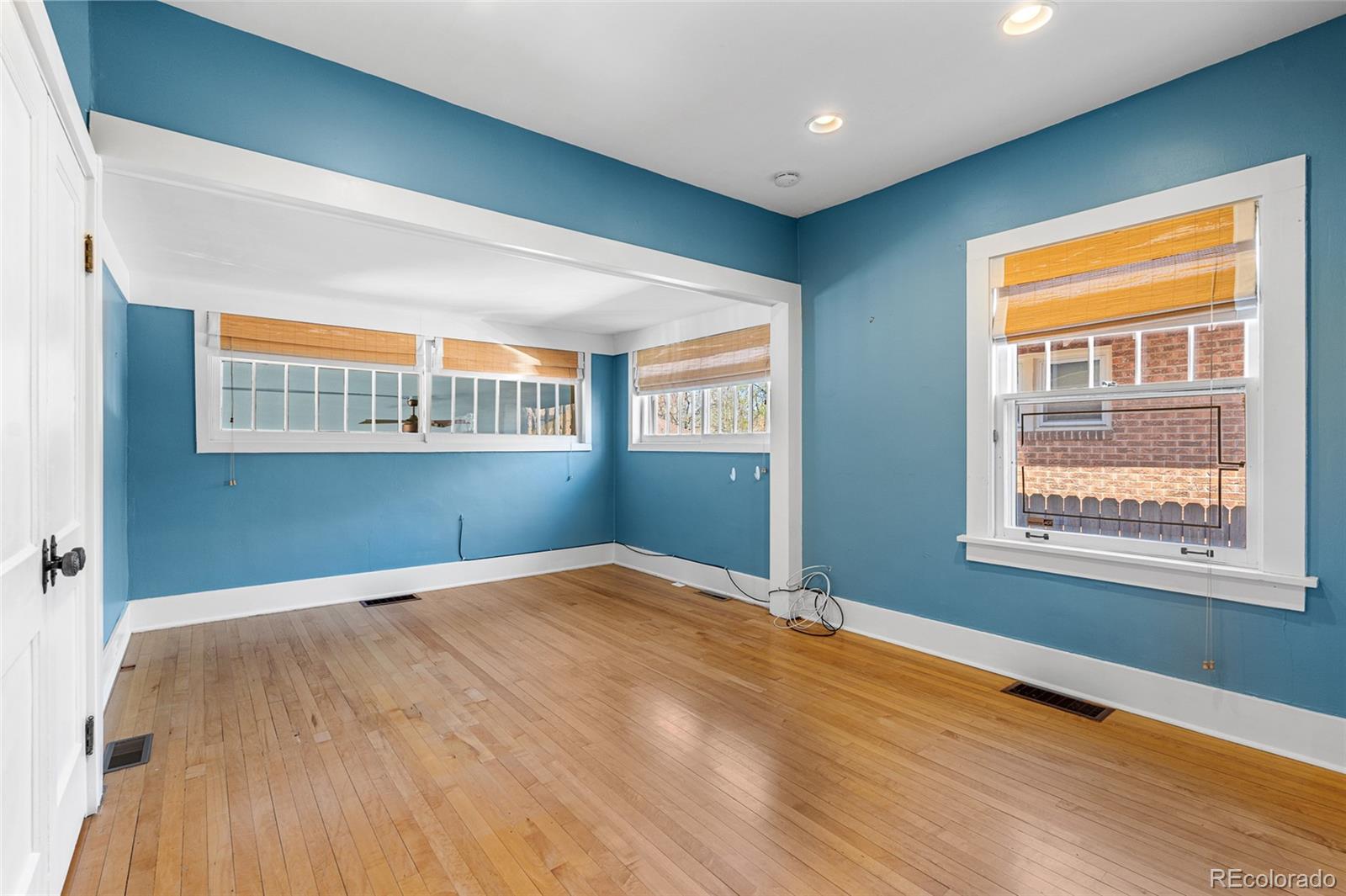 1065 Jackson Street Denver, CO 80206 - Photo 25 of 50 a view of an empty room with a window
