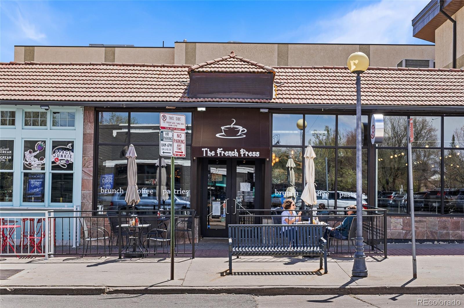1065 Jackson Street Denver, CO 80206 - Photo 46 of 50 a view of a cafe with outdoor space