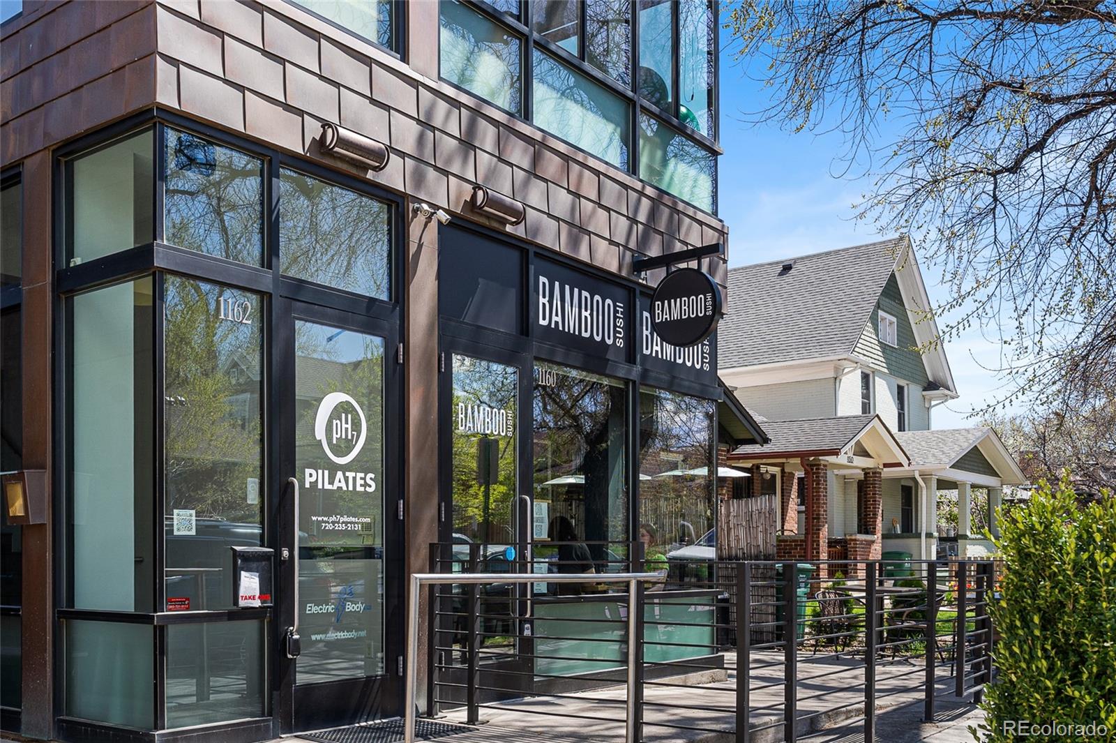 1065 Jackson Street Denver, CO 80206 - Photo 48 of 50 a view of a building with a glass door
