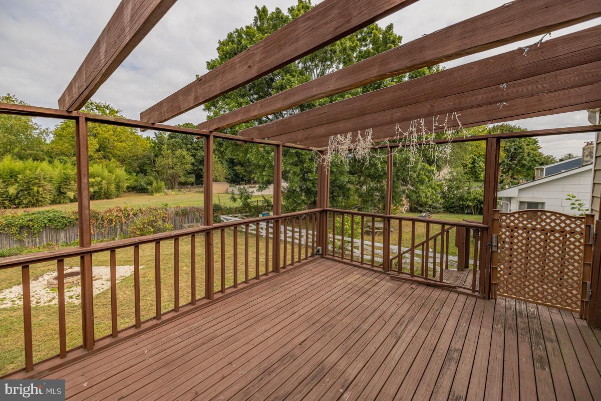892 Estates Boulevard Hamilton, NJ 08690 - Photo 21 of 36 a porch with wooden floor in outdoor space