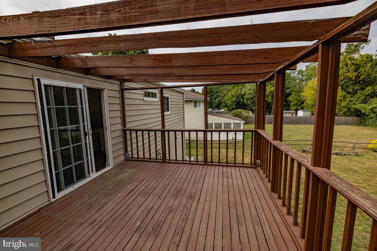 892 Estates Boulevard Hamilton, NJ 08690 - Photo 22 of 36 a view of a porch with wooden floor