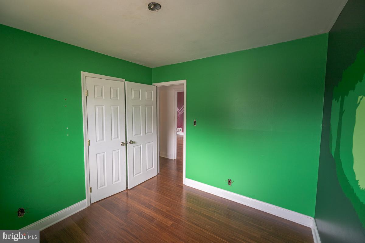 892 Estates Boulevard Hamilton, NJ 08690 - Photo 28 of 36 a view of room with window and stairs