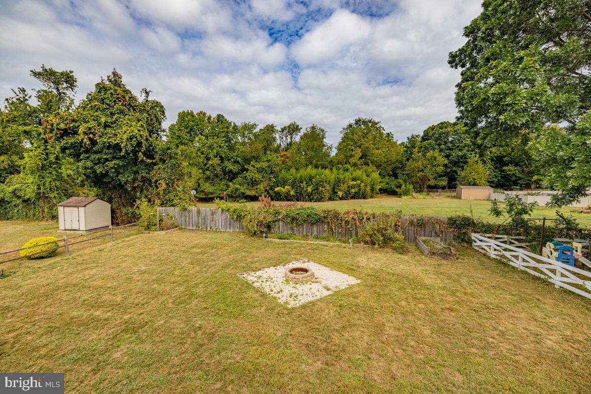 892 Estates Boulevard Hamilton, NJ 08690 - Photo 29 of 36 a view of a yard with an outdoor space