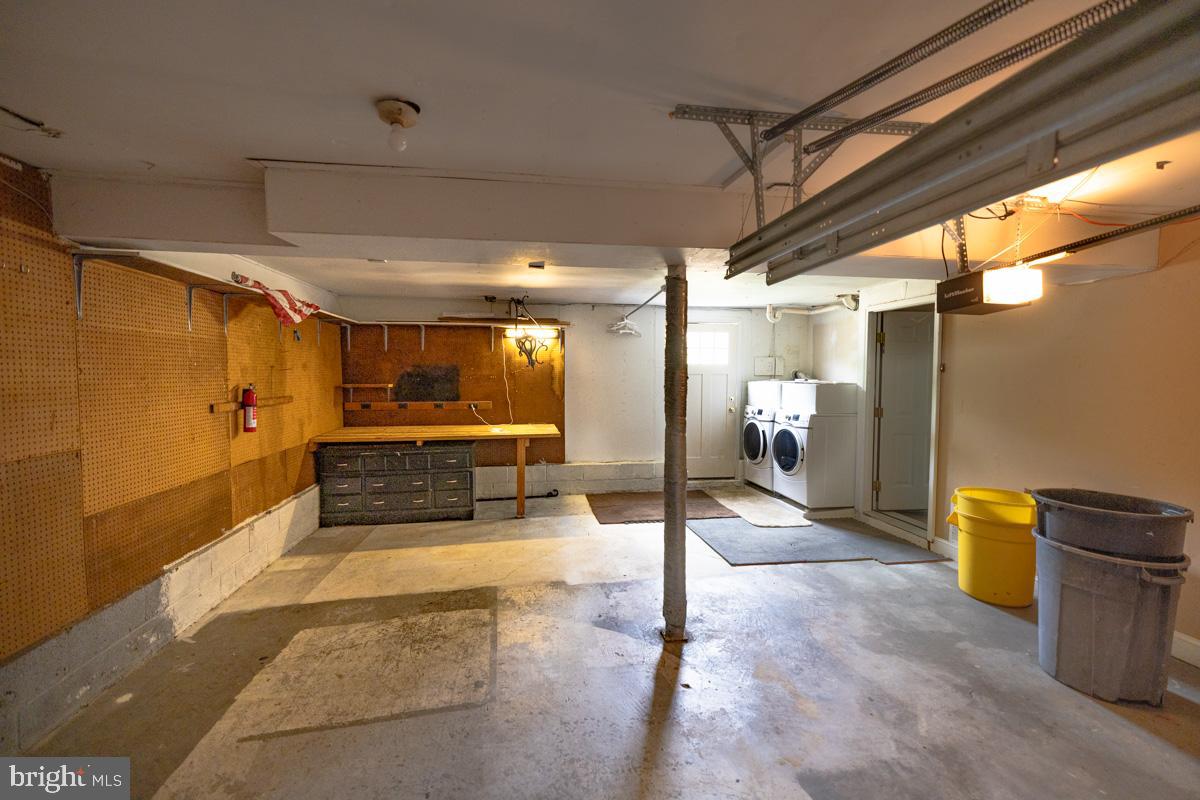 892 Estates Boulevard Hamilton, NJ 08690 - Photo 35 of 36 a view of a hall with wooden floor