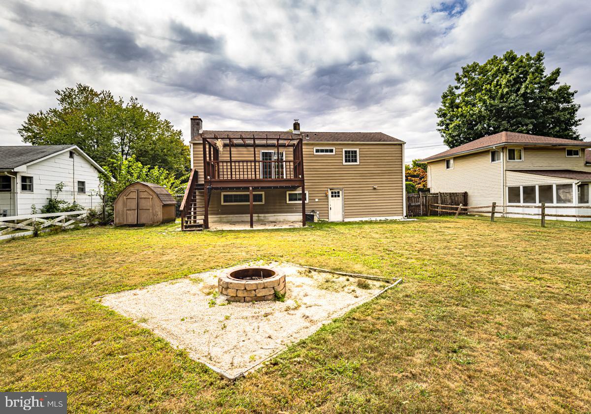 892 Estates Boulevard Hamilton, NJ 08690 - Photo 5 of 36 a view of a house with a swimming pool