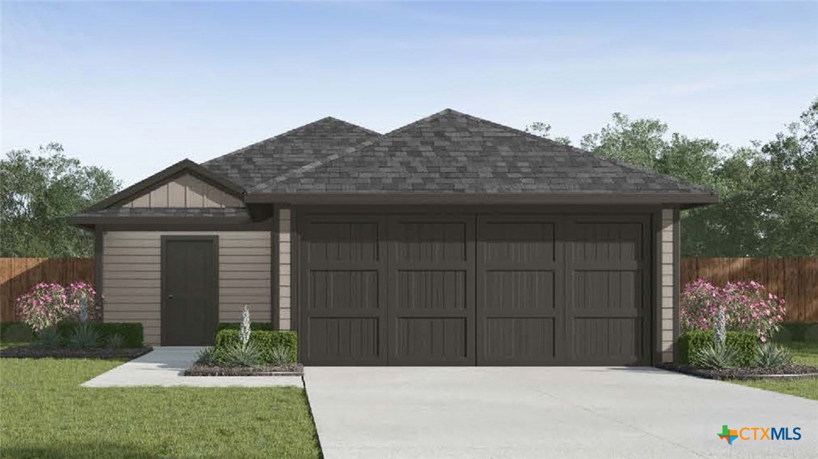 1303 Newey Circle Temple, TX 76504 - Photo 1 of 33 a front view of a house with garden