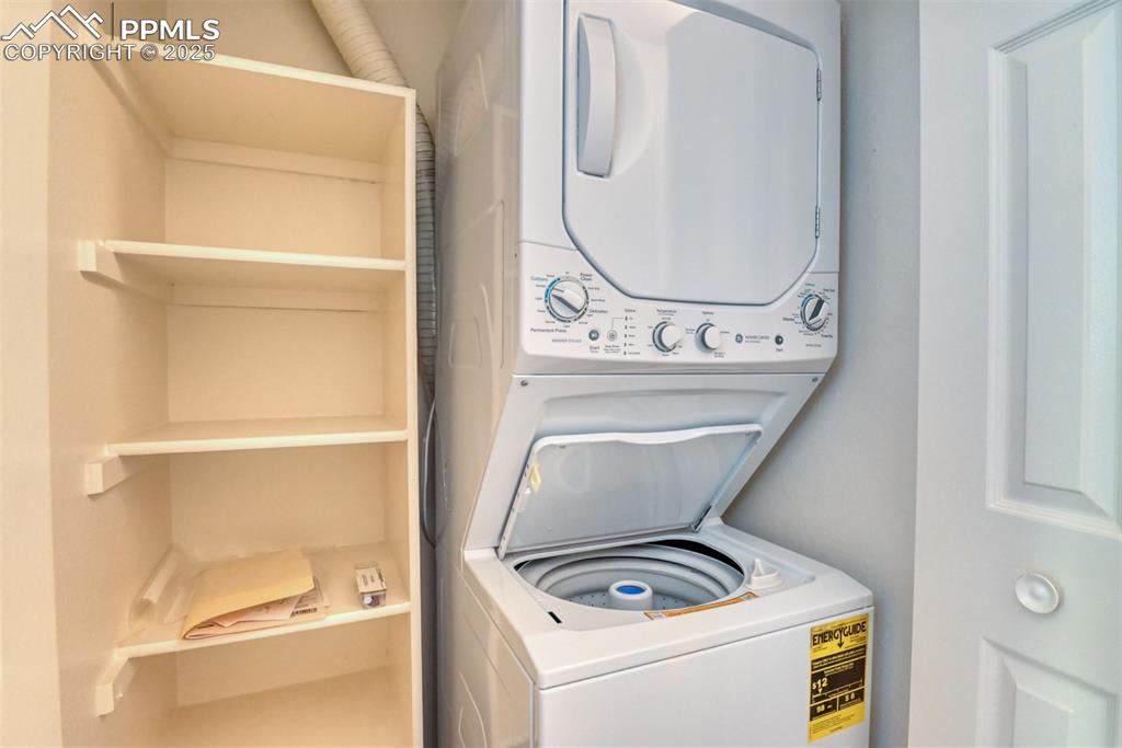 916 Tenderfoot Hill Road, Unit 101 Colorado Springs, CO 80906 - Photo 22 of 42 a utility room with dryer and washer