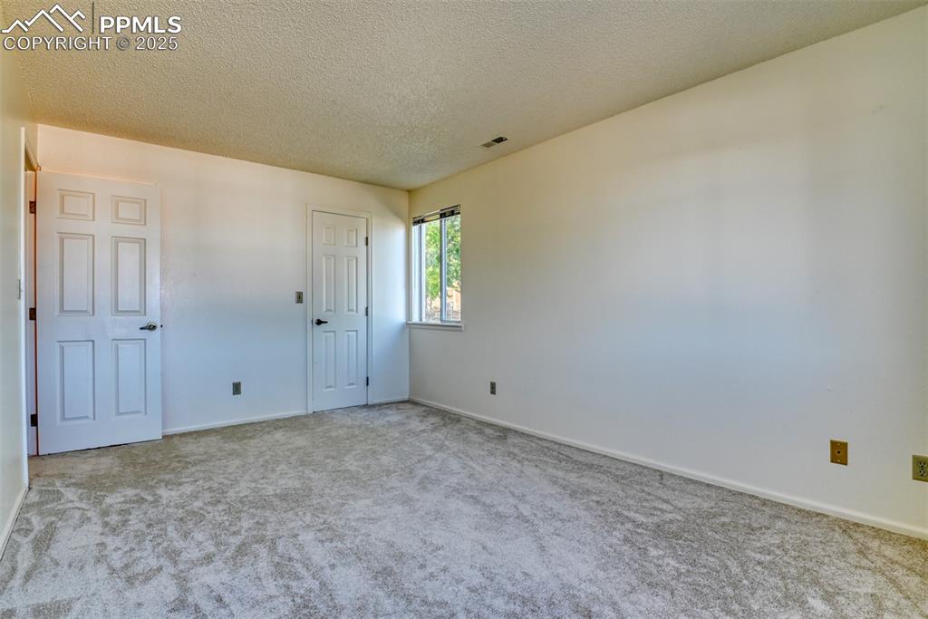 916 Tenderfoot Hill Road, Unit 101 Colorado Springs, CO 80906 - Photo 24 of 42 a view of an empty room