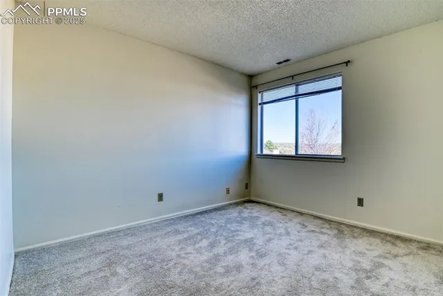 an empty room with an entryway