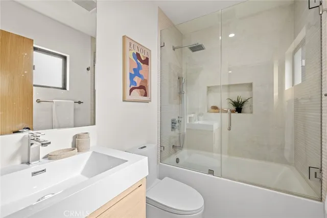 a dining room with a table and chairs