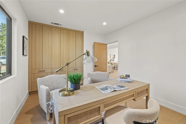 a living room with furniture and window